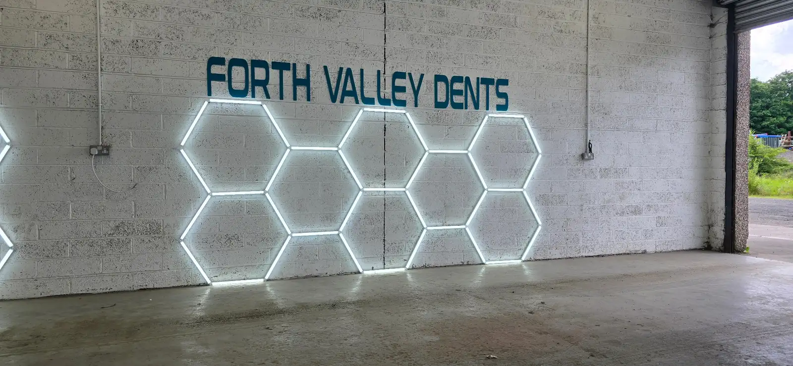Forth Valley Dents Falkirk workshop with hex LED lighting